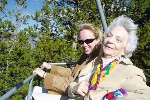 Grandmother and granddaughter enjoying a gondola ride
