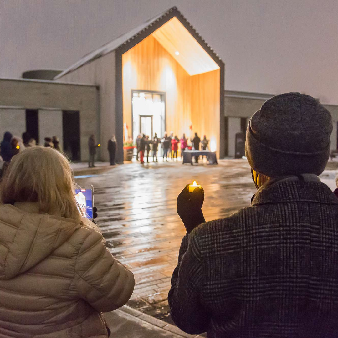 Instagram 3 People holding candles at the Lights of Love event