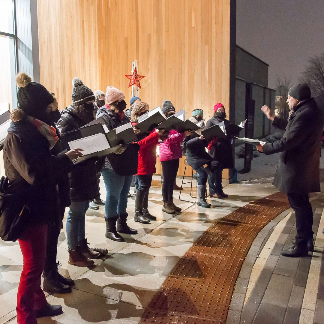 The Grand Philharmonic Choir singing at the Lights of Love event