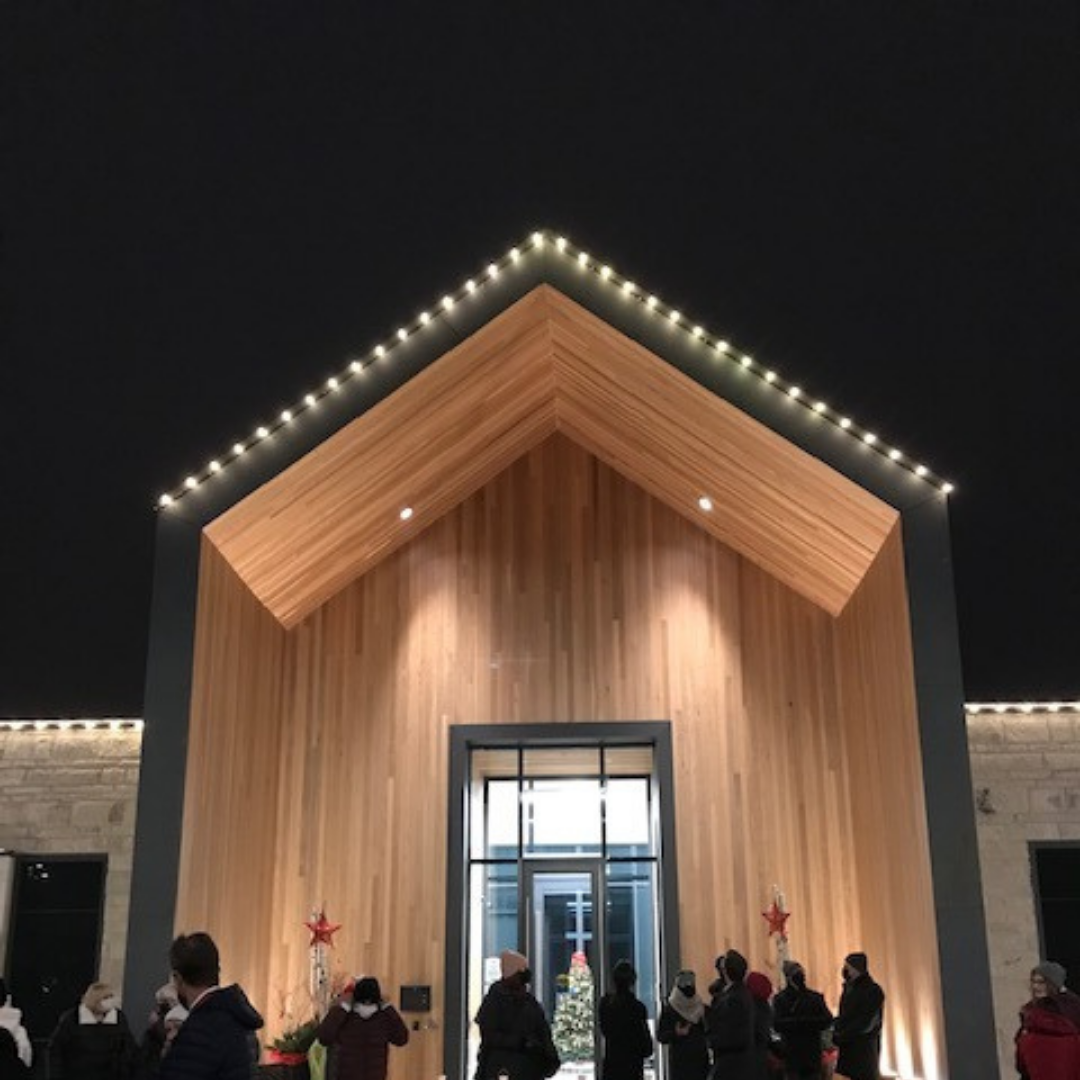 The front entrance of The Gies Family Centre lit up for the Lights of Love event