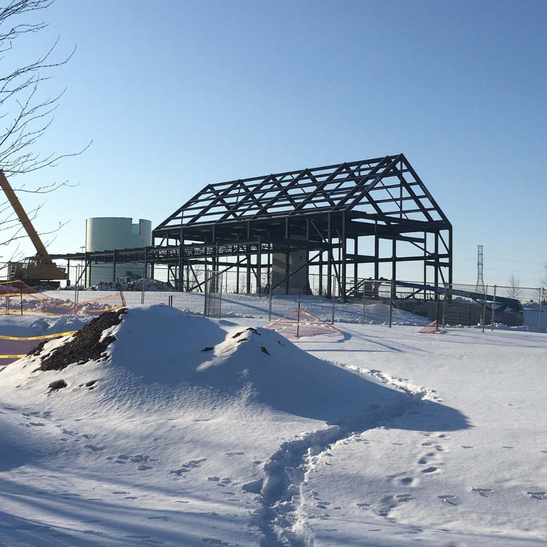 Framed outline of The Gies Family Centre in the snow